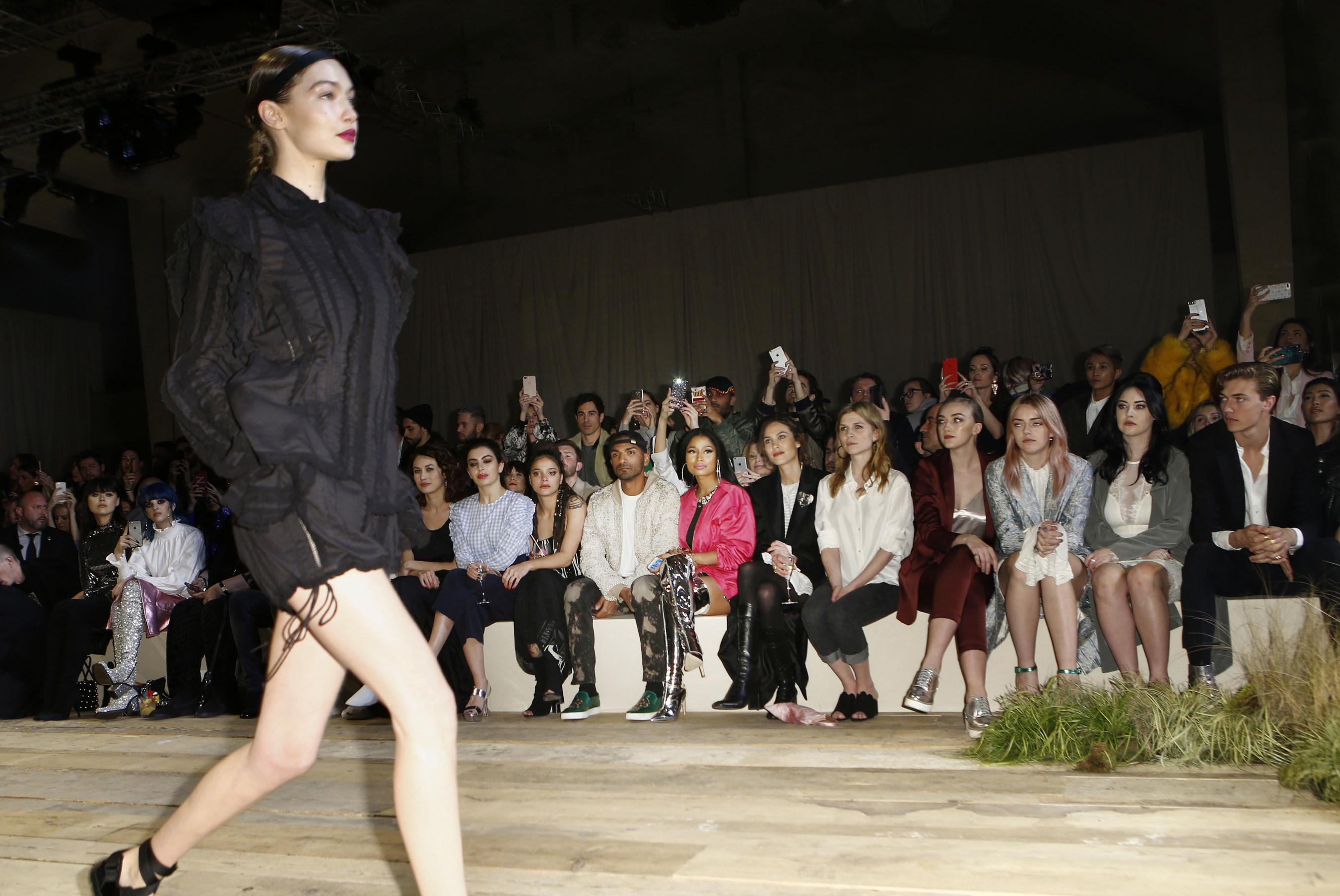Gigi Hadid walks the runway at the H&M Studio show in Paris.