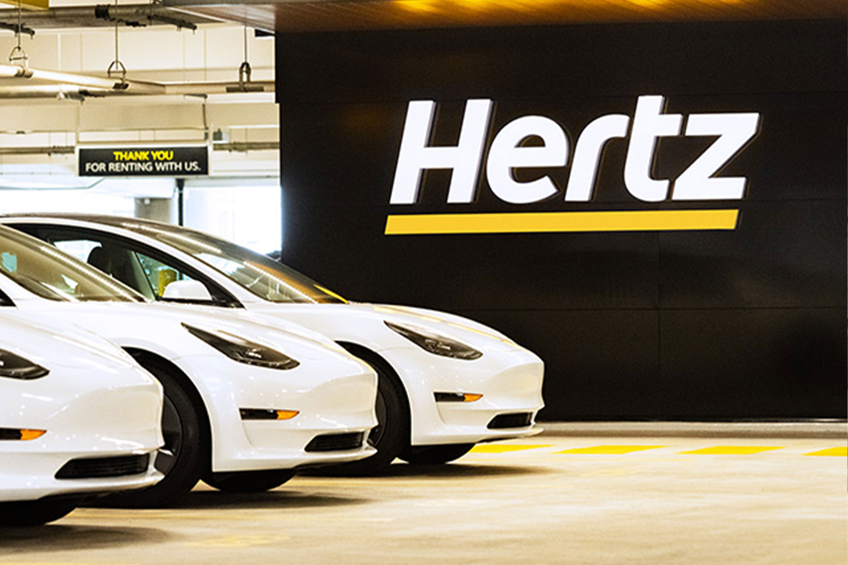 Hertz Invests in Tesla Fleet and Partners with Tom Brady LATF USA NEWS