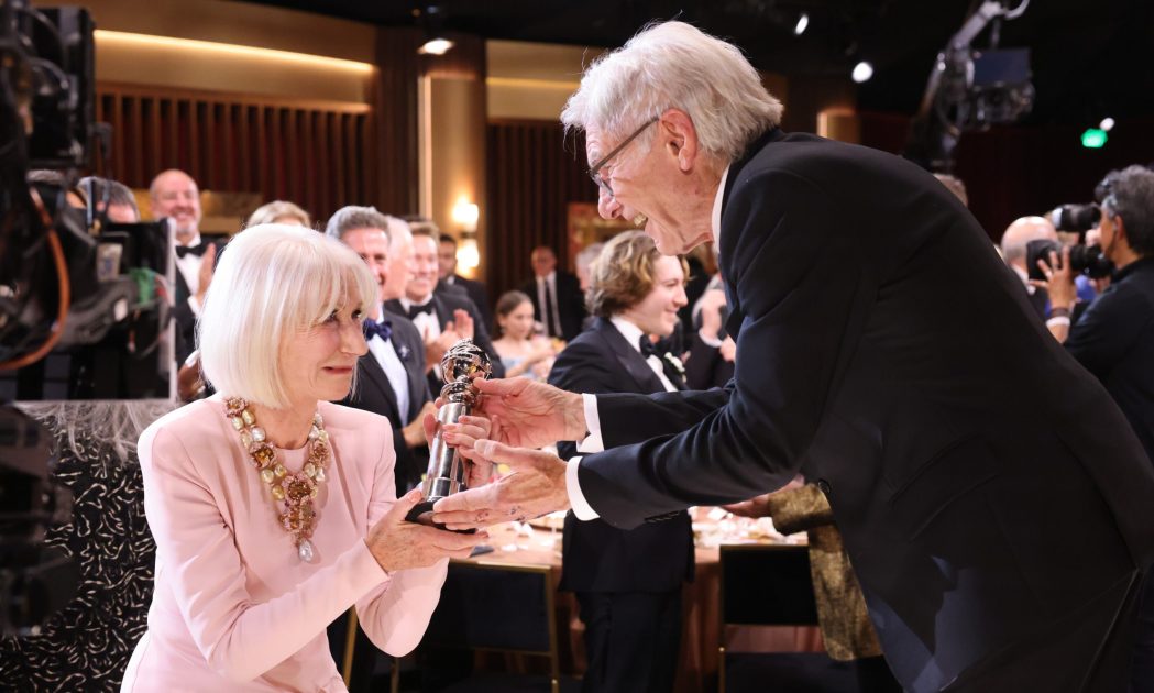 Dame Helen Mirren and Harrison Ford at Golden Eve: The Golden Globes Honor Helen Mirren & Sarah Jessica Parker the CBS Original Series BEYOND THE GATES, scheduled to air on the CBS Television Network.  Photo: Matthew Taplinger/CBS ©2026 CBS Broadcasting, Inc. All Rights Reserved.