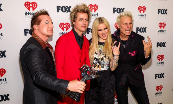 LOS ANGELES, CALIFORNIA - APRIL 01: (FOR EDITORIAL USE ONLY) (L-R) Tré Cool, Billie Joe Armstrong, and Mike Dirnt of Green Day, winners of the Landmark Award, and Avril Lavigne (2nd from R) attend the 2024 iHeartRadio Music Awards at Dolby Theatre in Los Angeles, California on April 01, 2024. Broadcasted live on FOX. (Photo by Jesse Grant/Getty Images for iHeartRadio)