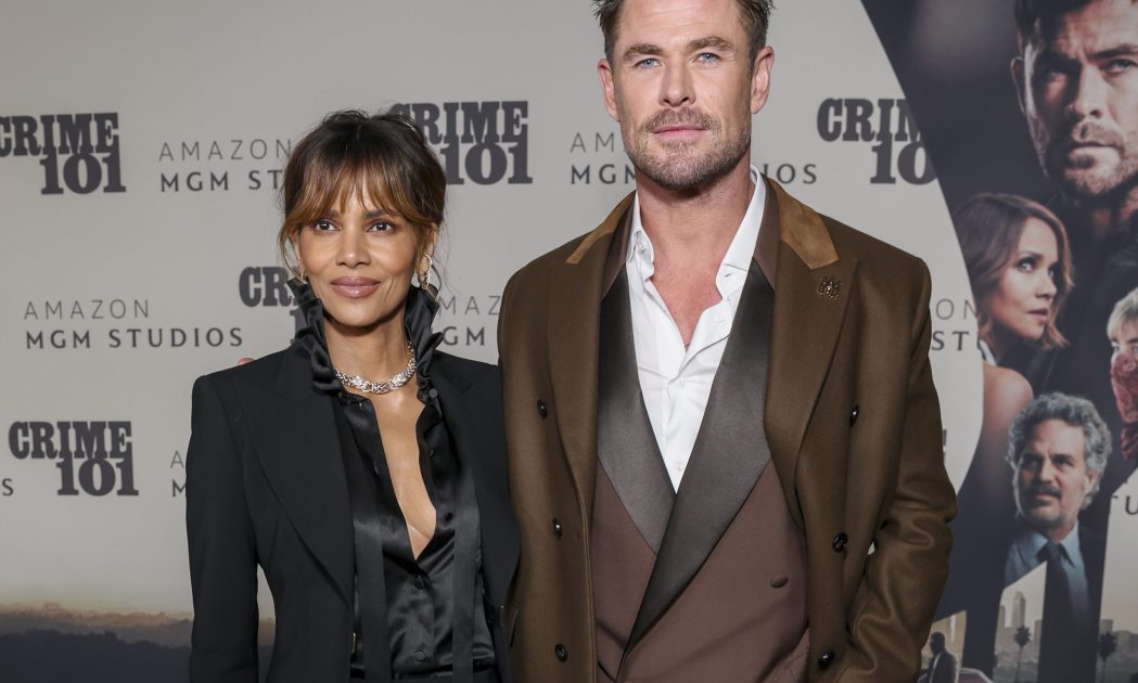 Halle Berry and Chris Hemsworth attend the Amazon MGM Crime 101 World Premiere on February 10, 2026 at The United Theater in Los Angeles.